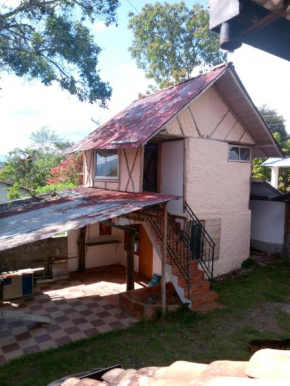 Botón de oro hostal